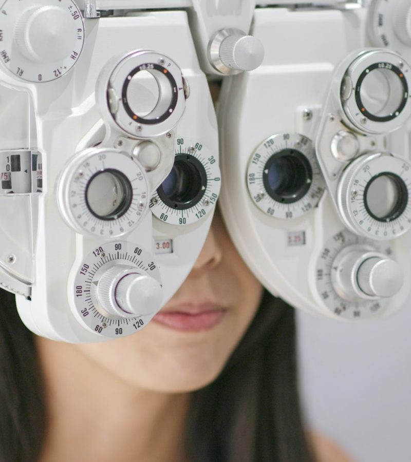 woman receiving an adult eye exam